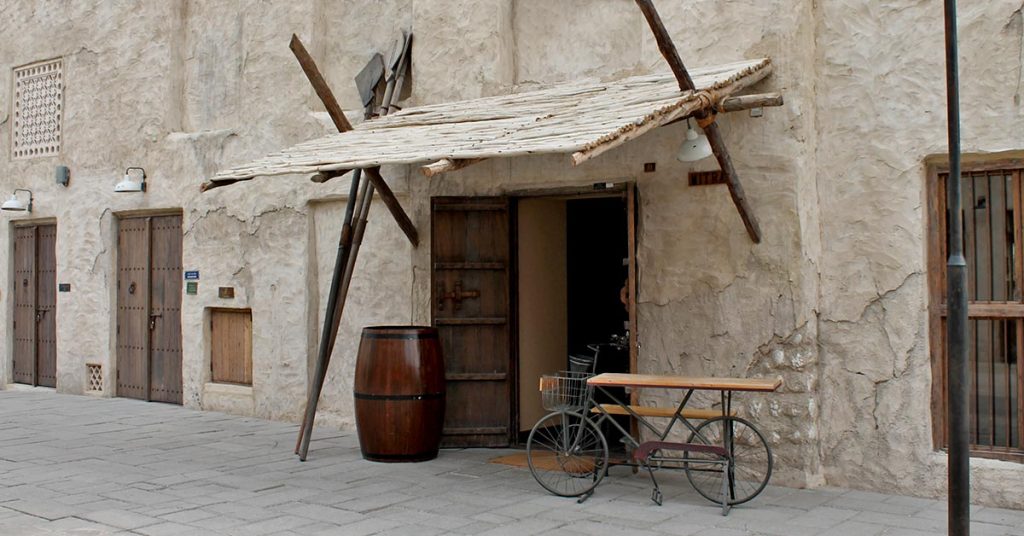 Wooden pergola awning creating a shaded area.