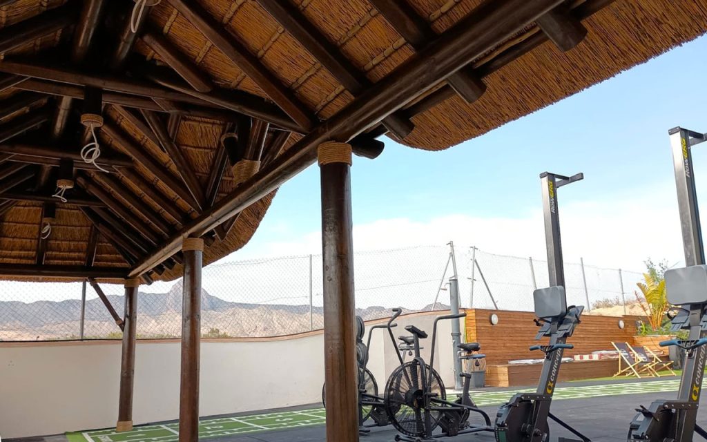 Bespoke Cape Reed timber and thatch pavilion overlooking the Spanish countryside at CrossFinca